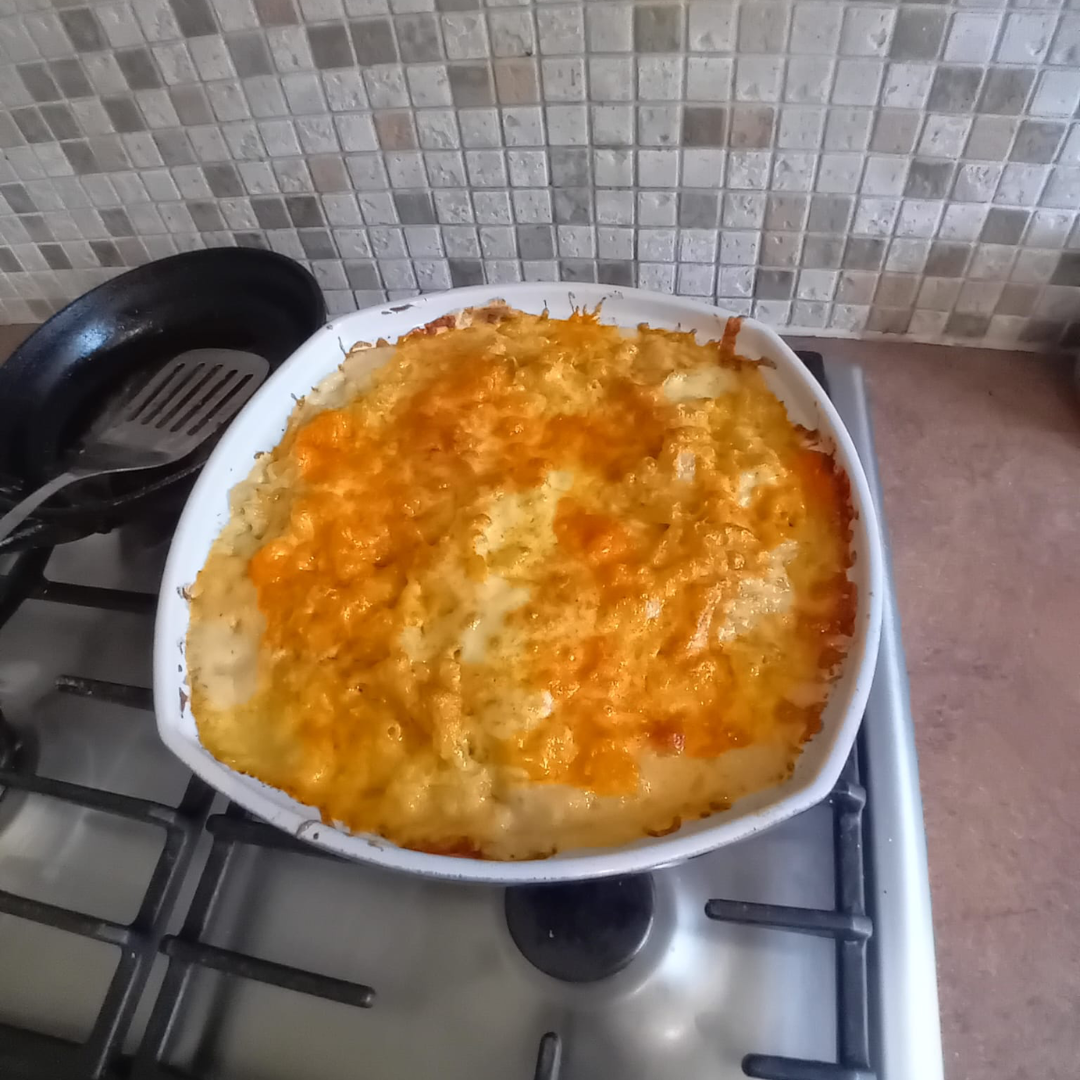 A delicious macaroni bake in a square bowl plate